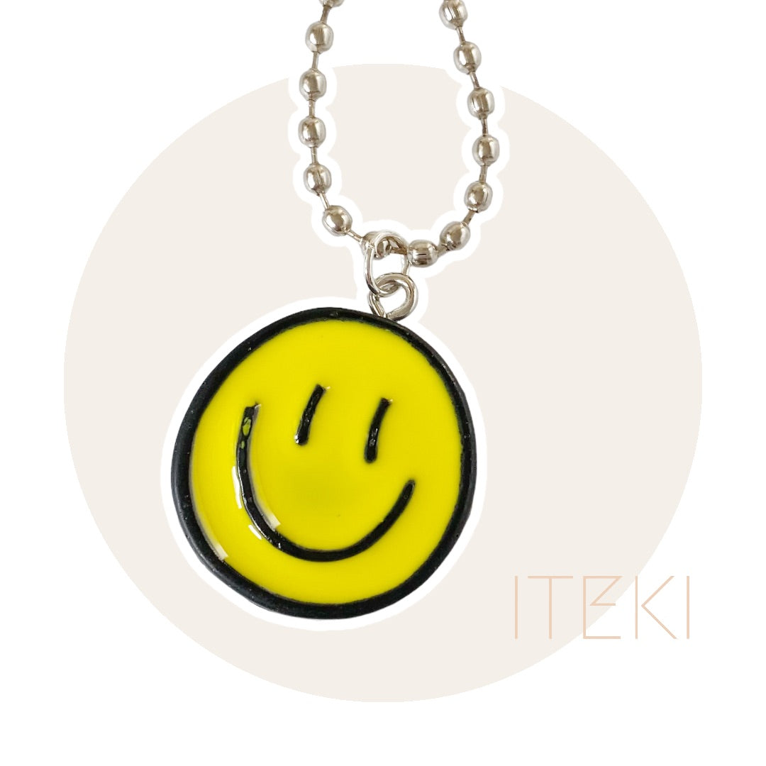 Sneaker chain smiley geel/zwart